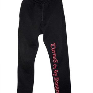VETEMENTS “TURNED ON BY DANGER” SWEATPANTS